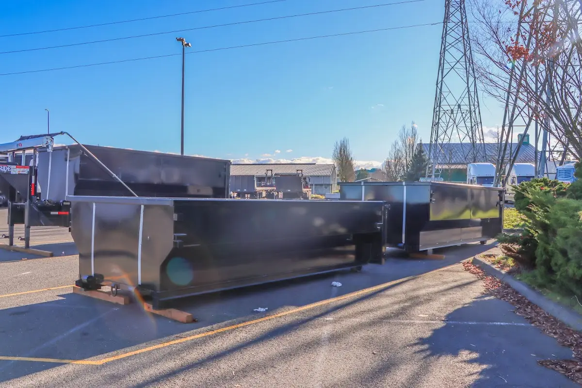 Roll-off dumpster ready for waste disposal at job site for 4 Yard Dumpster Rental in Branford